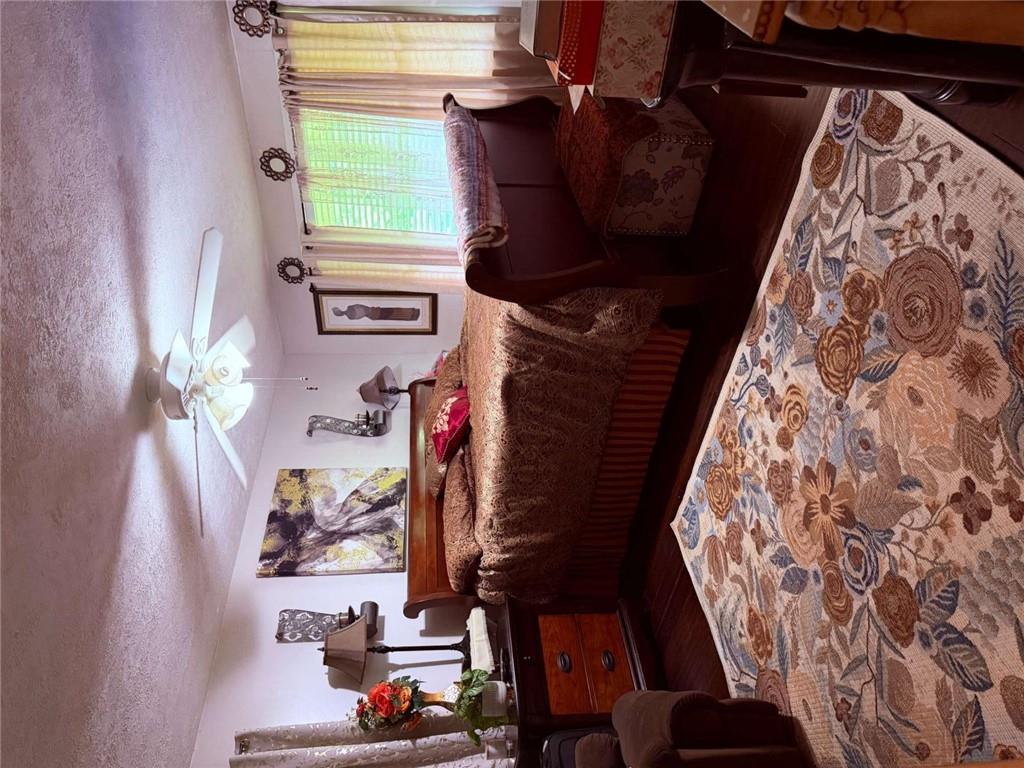 1972 Mt Zion Road Oxford, GA 30054 - Photo 13 of 15 a bedroom with a bed window and dresser