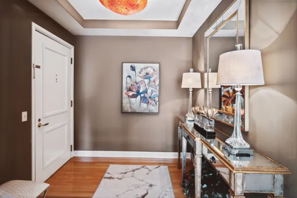 a view of an entryway with furniture and a window