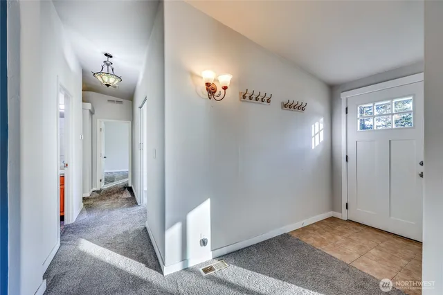 a view of a hallway with closet