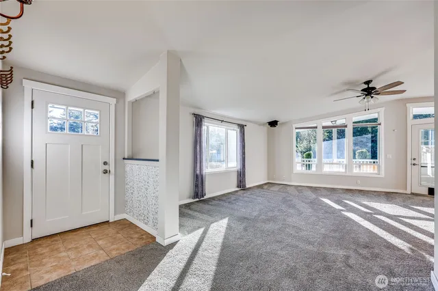 a view of a room with windows