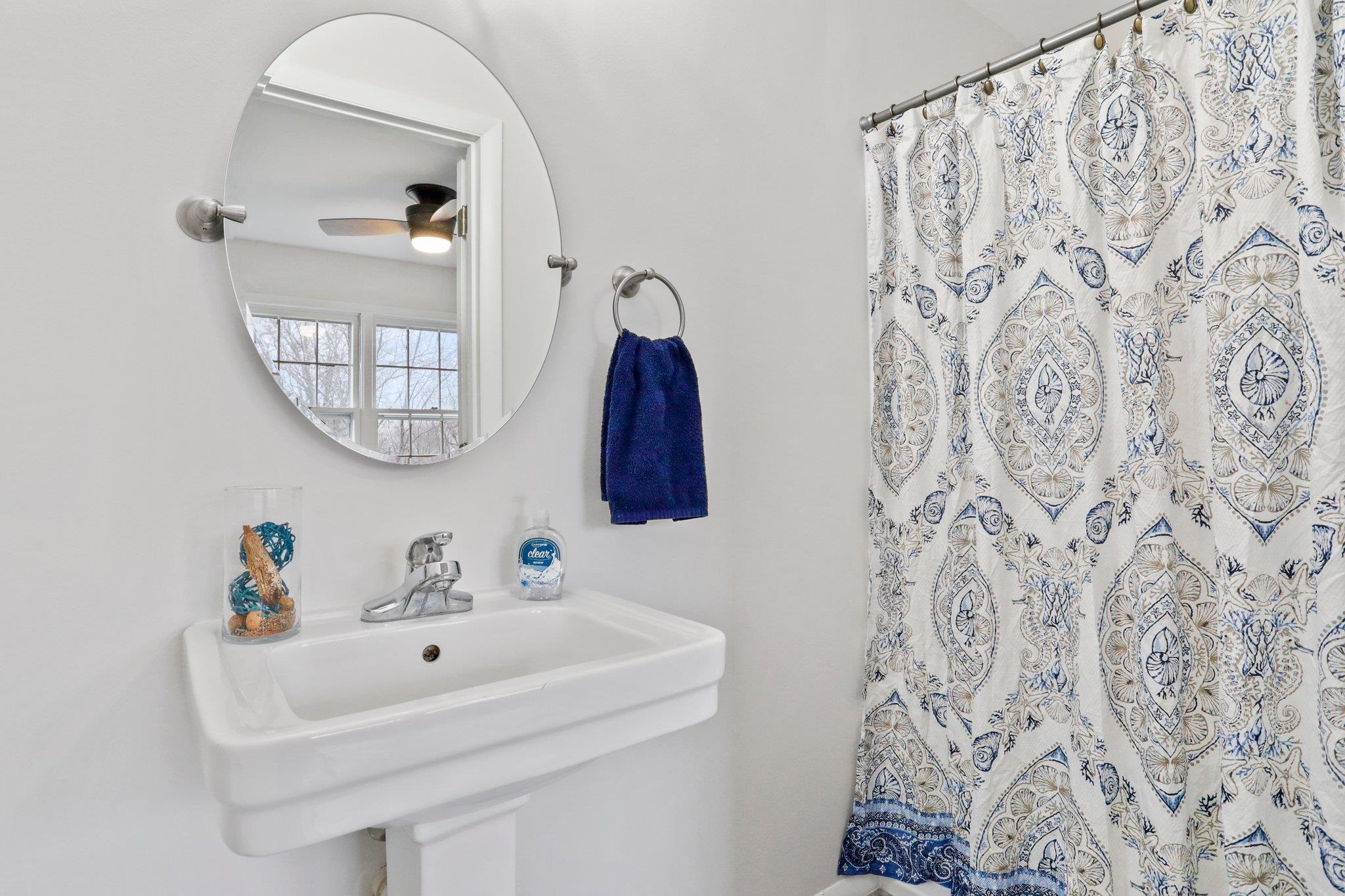 18196 New Market Road Timberville, VA 22853 - Photo 20 of 34 a bathroom with a sink and a mirror