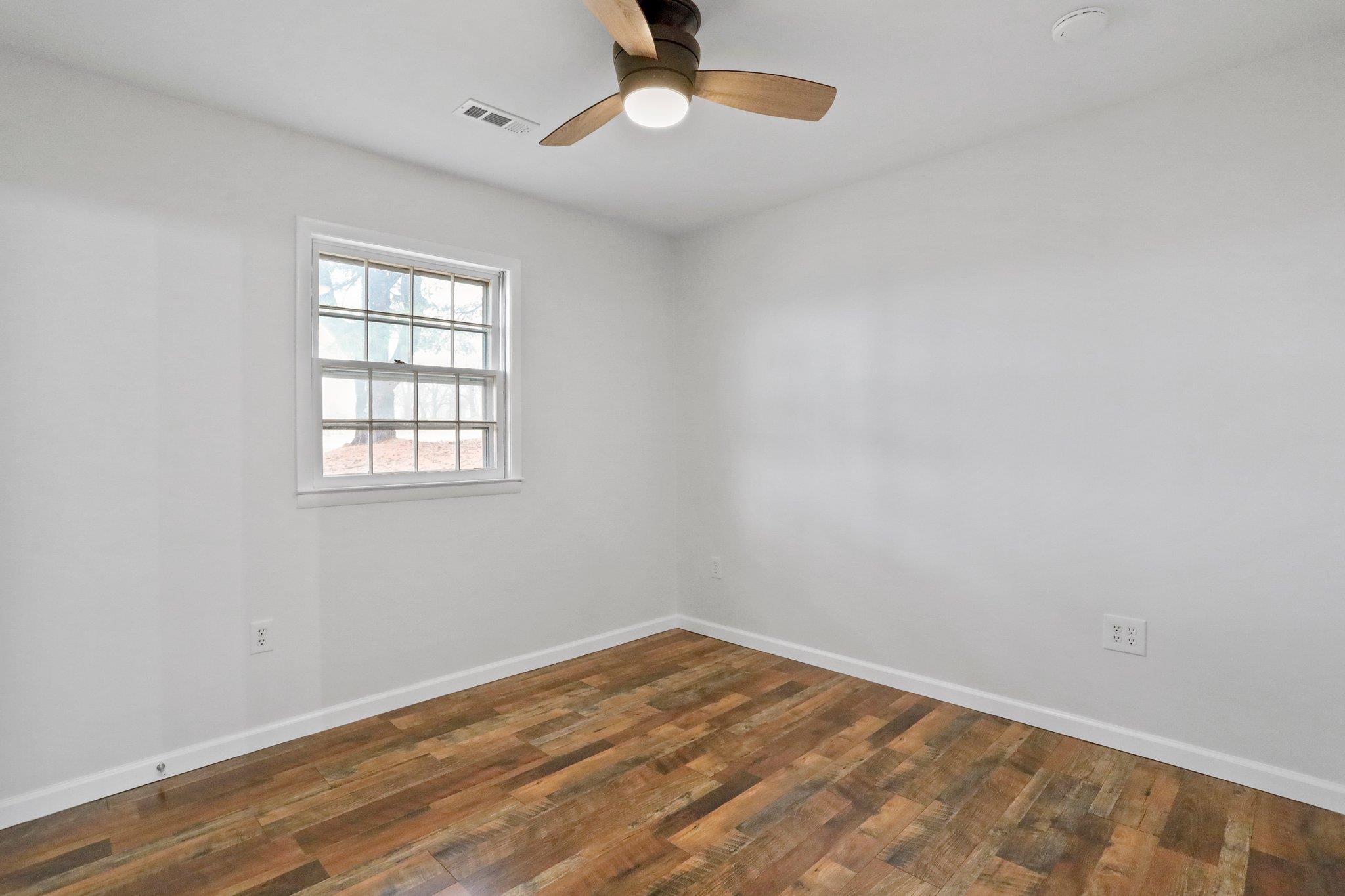 18196 New Market Road Timberville, VA 22853 - Photo 24 of 34 an empty room with a window