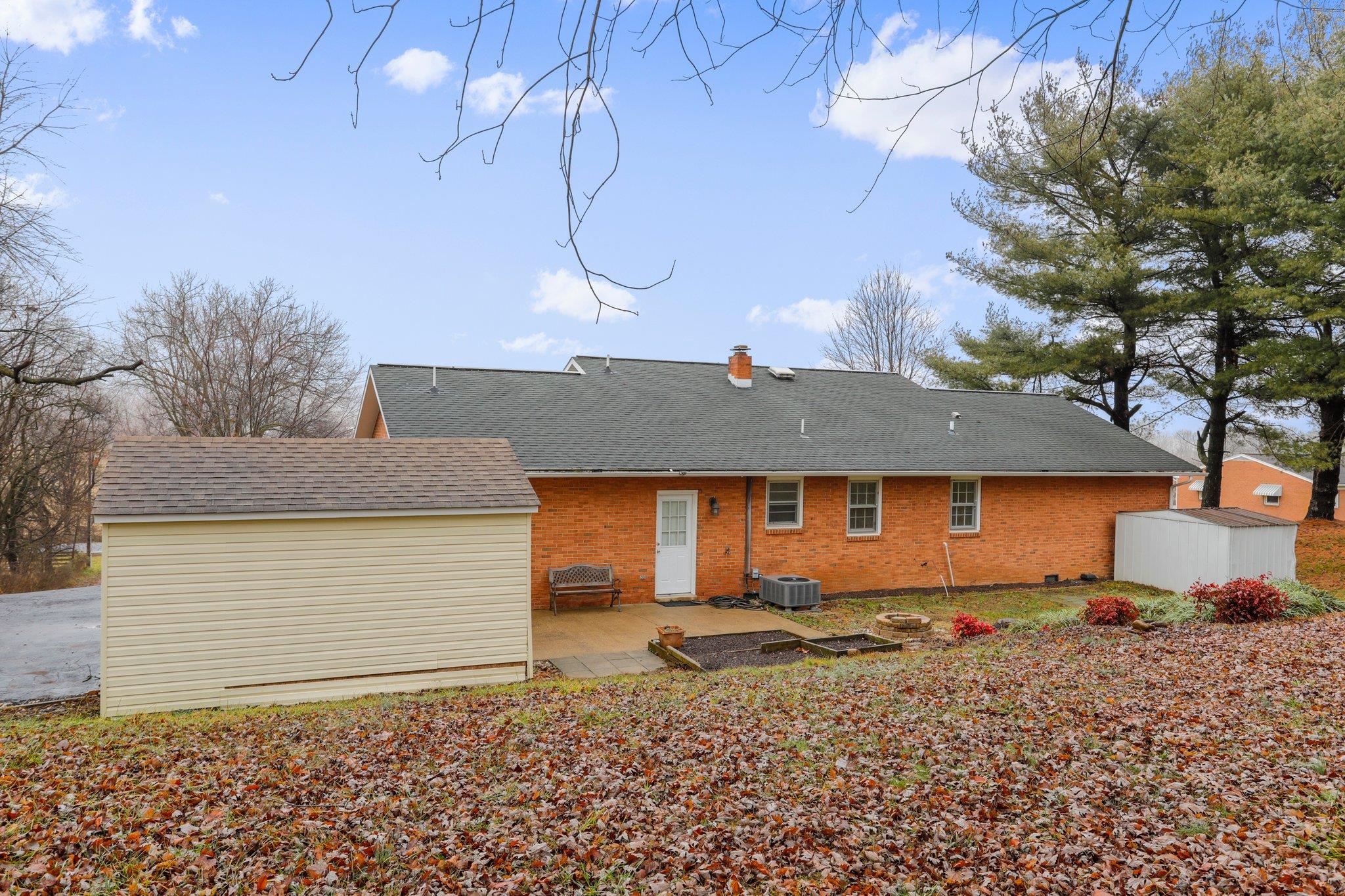 18196 New Market Road Timberville, VA 22853 - Photo 28 of 34 a view of a house with a yard