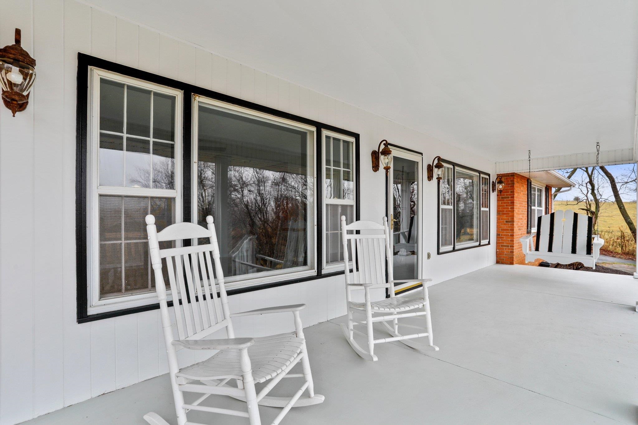 18196 New Market Road Timberville, VA 22853 - Photo 31 of 34 a view of entryway and hall with dining room