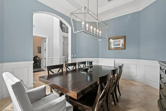 a view of a room with a floor to ceiling window and an outdoor kitchen