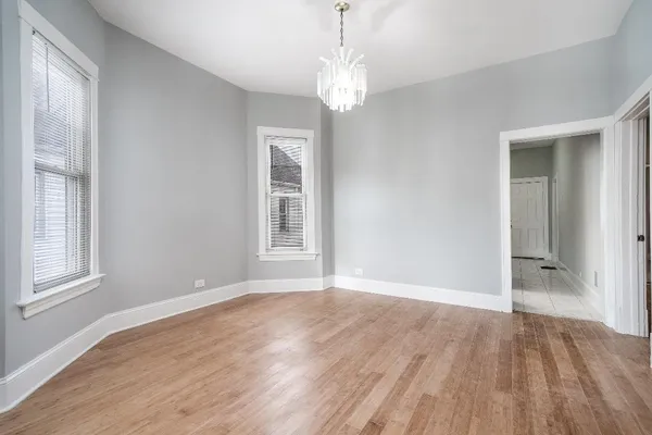 a view of livingroom with window and wooden floor