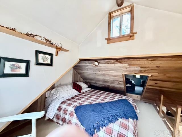 22258 Crestline Road Palomar Mountain, CA 92060 - Photo 40 of 56 a bedroom with a bed and wooden floor