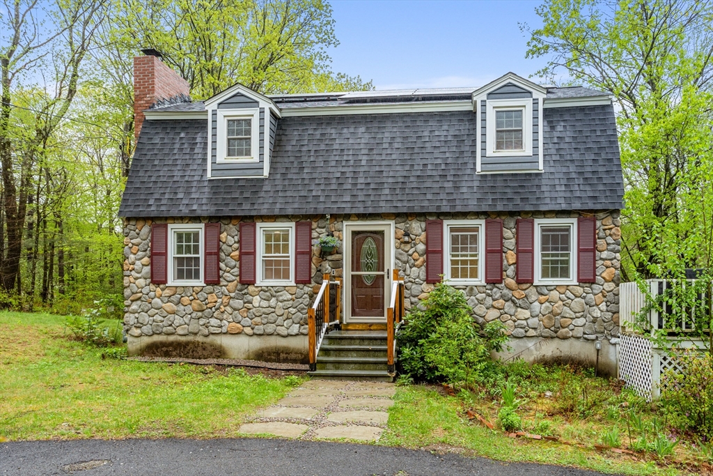 355 Wares Road Ashby, MA 01431 - Photo 1 of 38 a front view of a house with a yard