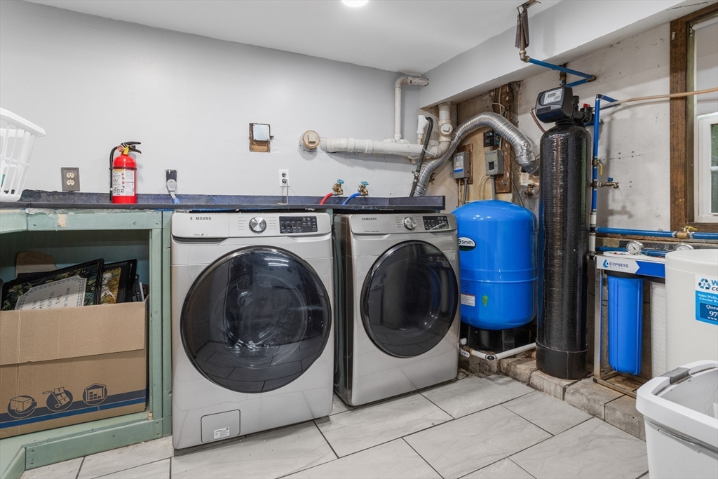 355 Wares Road Ashby, MA 01431 - Photo 32 of 38 a utility room with dryer and washer