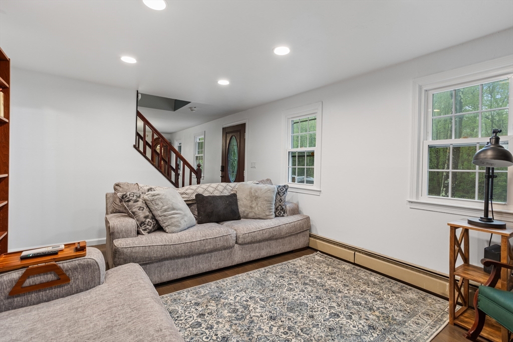 355 Wares Road Ashby, MA 01431 - Photo 8 of 38 a living room with furniture and a window