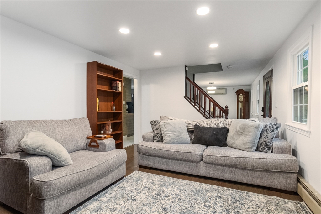 355 Wares Road Ashby, MA 01431 - Photo 9 of 38 a living room with furniture and a couch