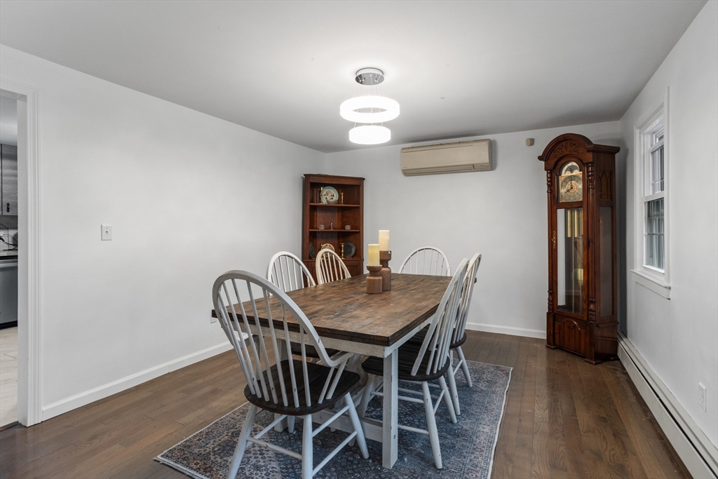 355 Wares Road Ashby, MA 01431 - Photo 10 of 38 a view of a dining room with furniture and wooden floor