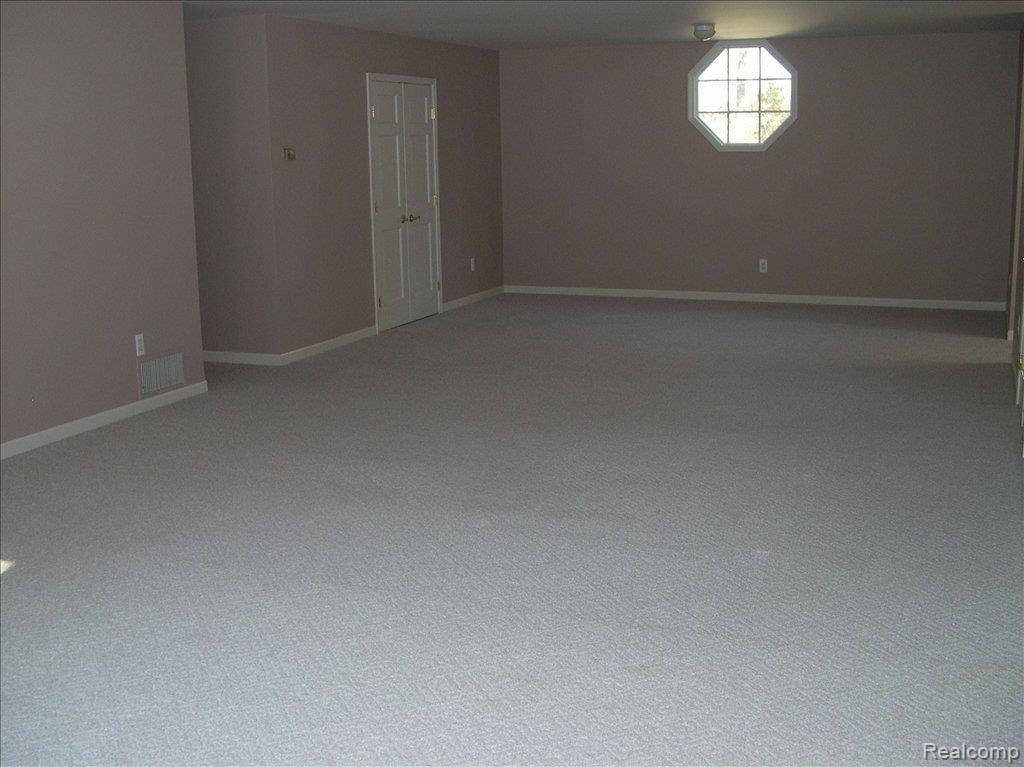 320 East Gunn Road Rochester, MI 48306 - Photo 12 of 16 Bonus Room with Closets and Furn