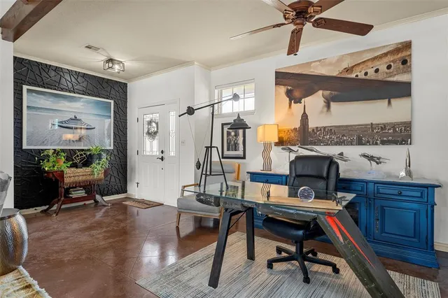 a reading room with furniture and a window