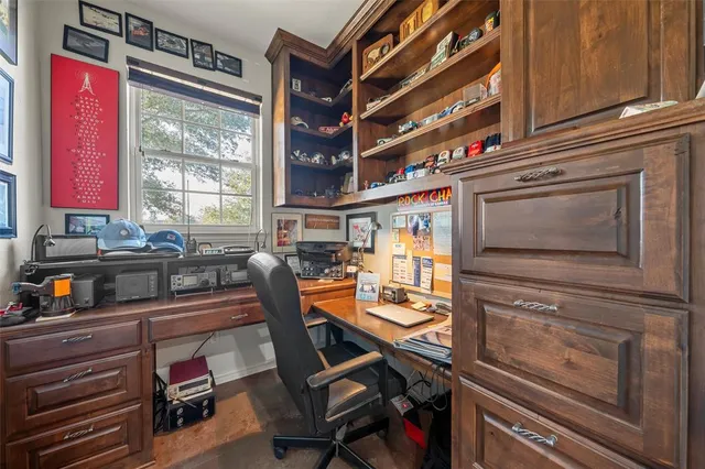 a kitchen with a stove a refrigerator and a stove top oven