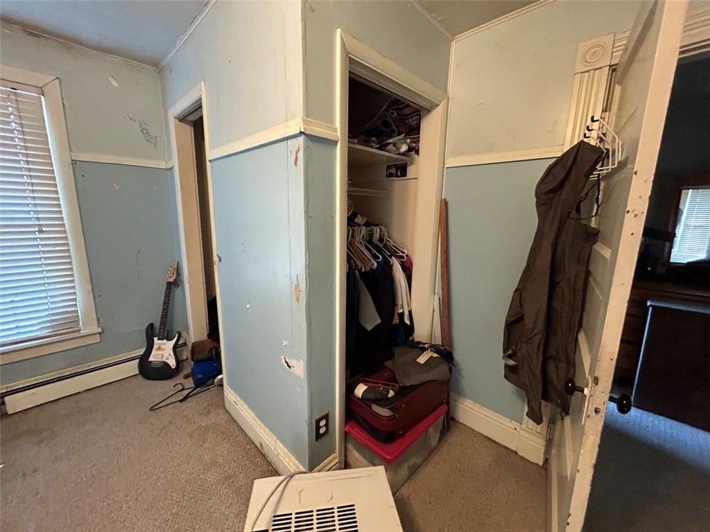 343 Malone Ridge Road Washington, PA 15301 - Photo 21 of 50 a view of walk in closet with clothes and shoes