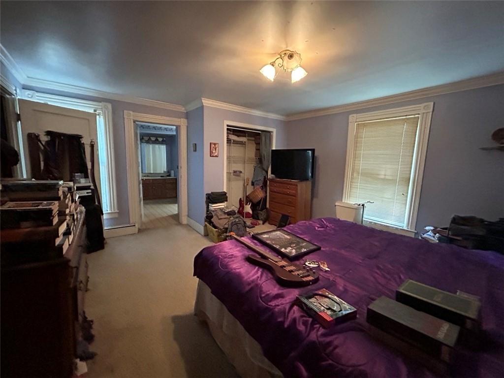 343 Malone Ridge Road Washington, PA 15301 - Photo 27 of 50 a bed room with a bed furniture and a flat tv screen