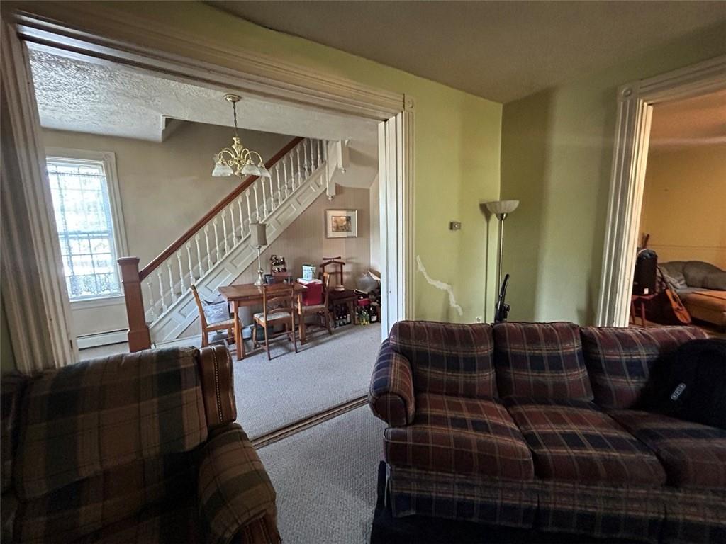 343 Malone Ridge Road Washington, PA 15301 - Photo 6 of 50 a living room with furniture and a wooden floor