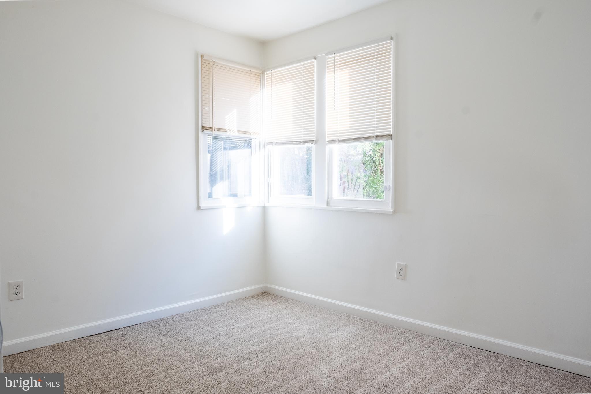 2027 Barlowe Place Landover, MD 20785 - Photo 11 of 20 an empty room with windows