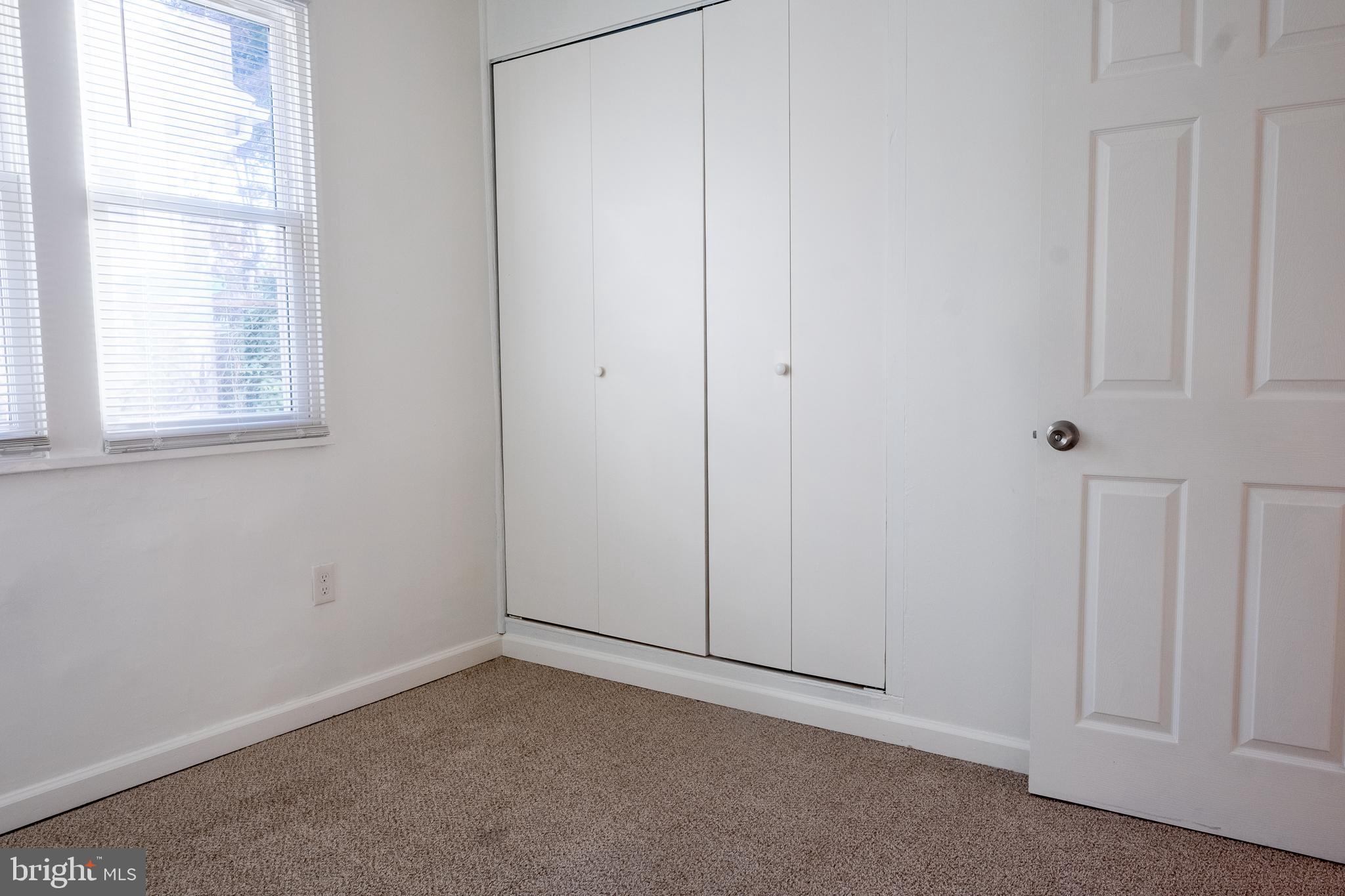 2027 Barlowe Place Landover, MD 20785 - Photo 12 of 20 an empty room with windows