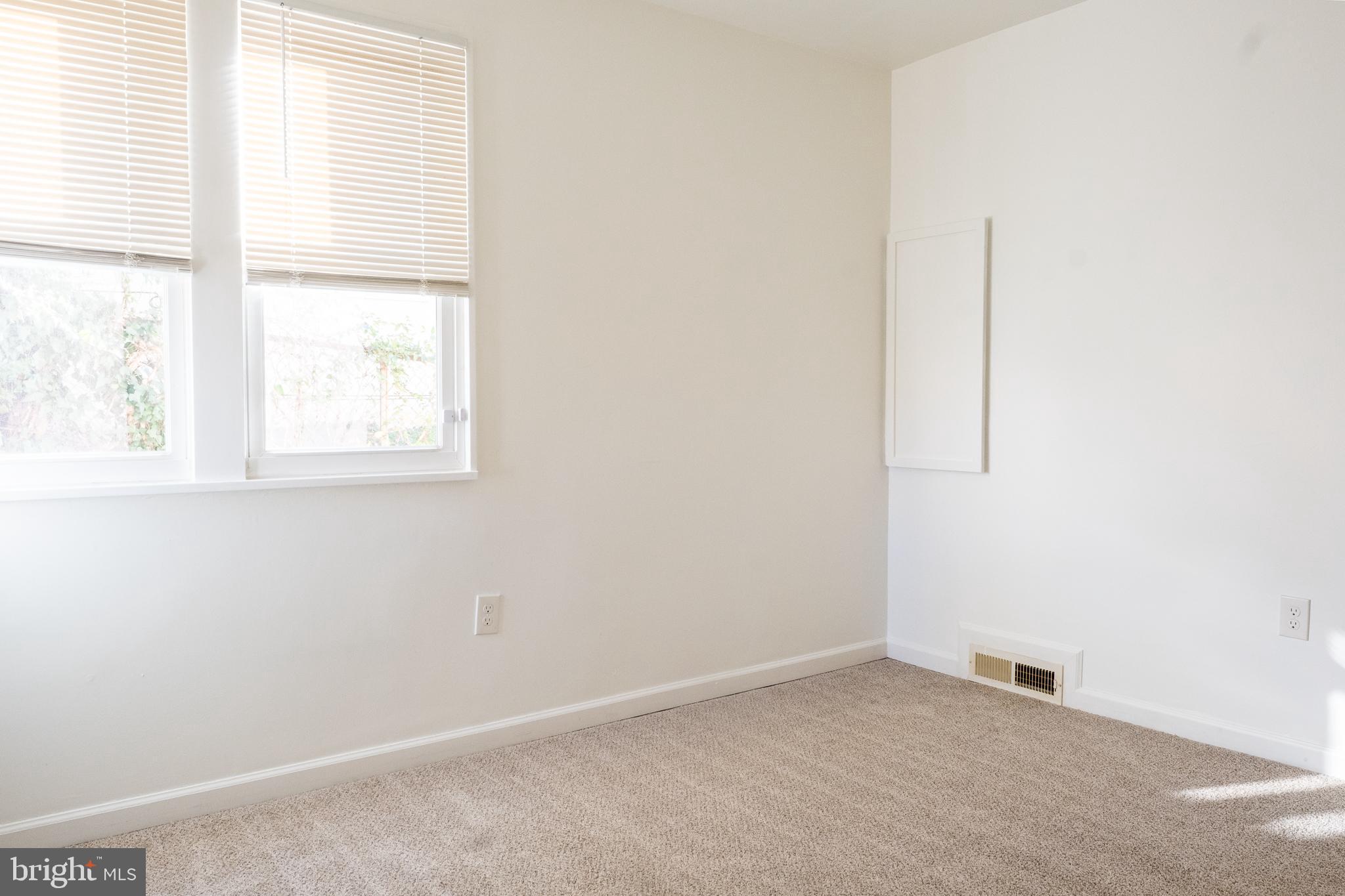 2027 Barlowe Place Landover, MD 20785 - Photo 15 of 20 an empty room with a window