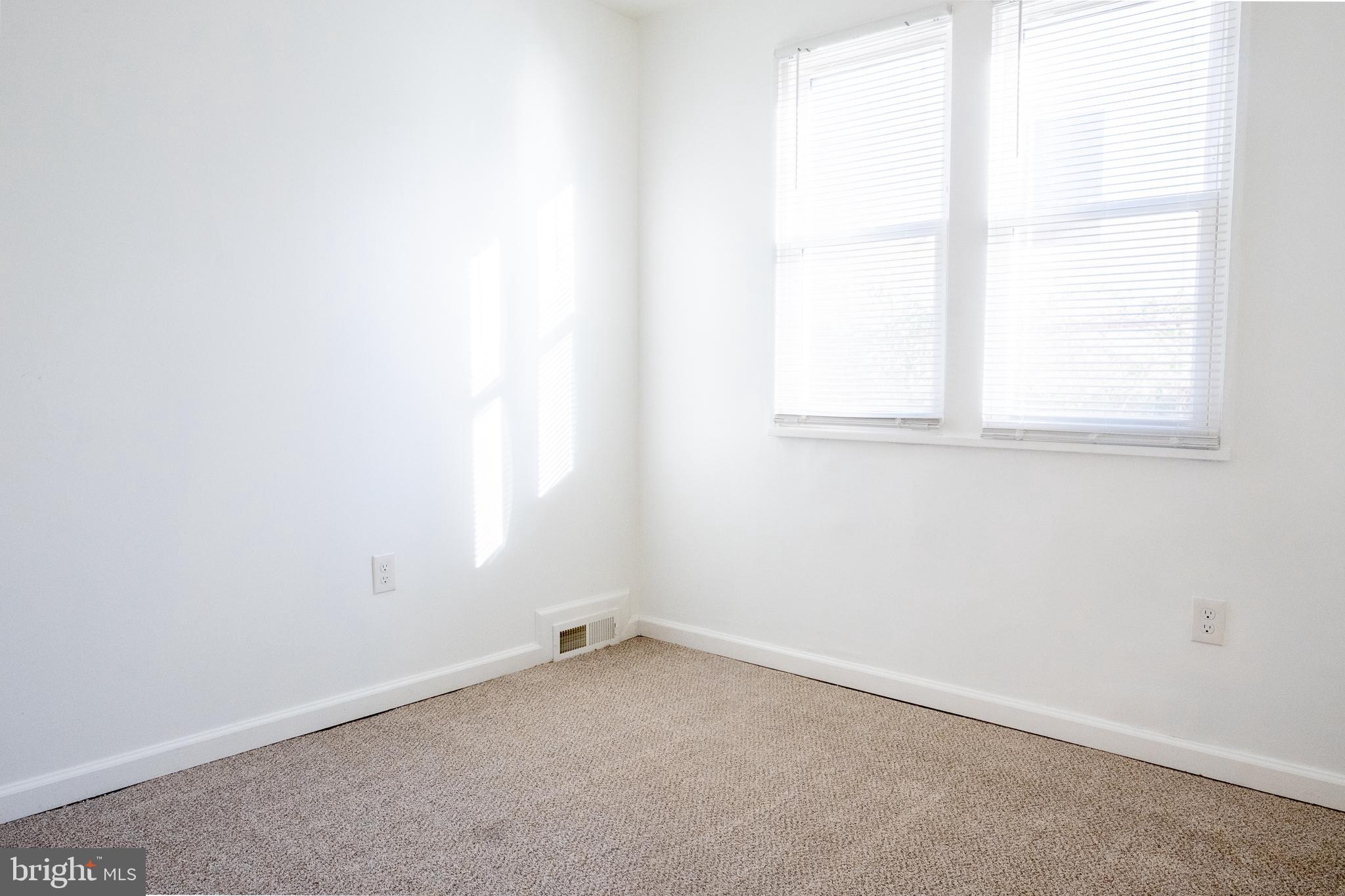 2027 Barlowe Place Landover, MD 20785 - Photo 16 of 20 an empty room with a window