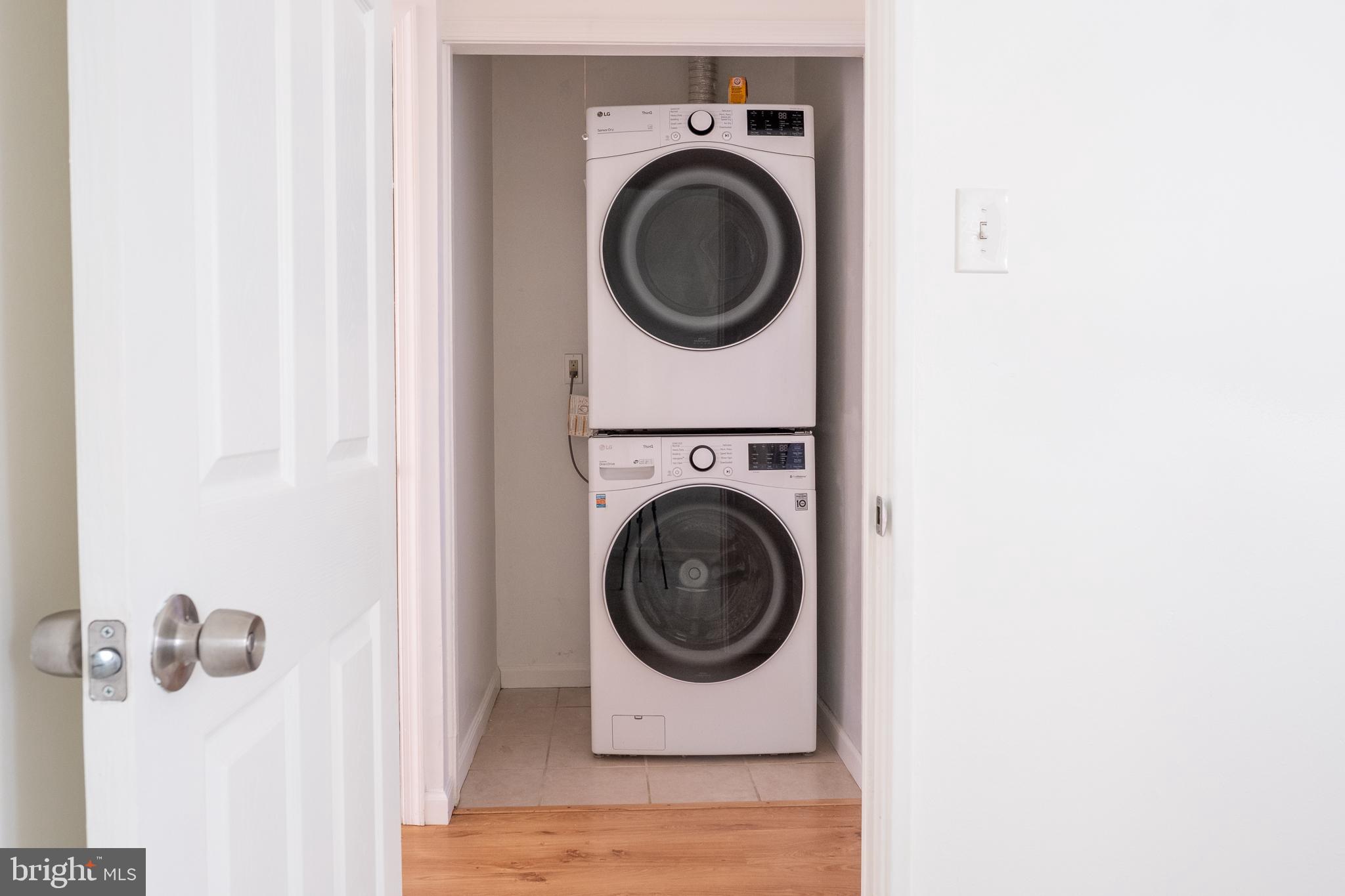 2027 Barlowe Place Landover, MD 20785 - Photo 19 of 20 a utility room with dryer and washer