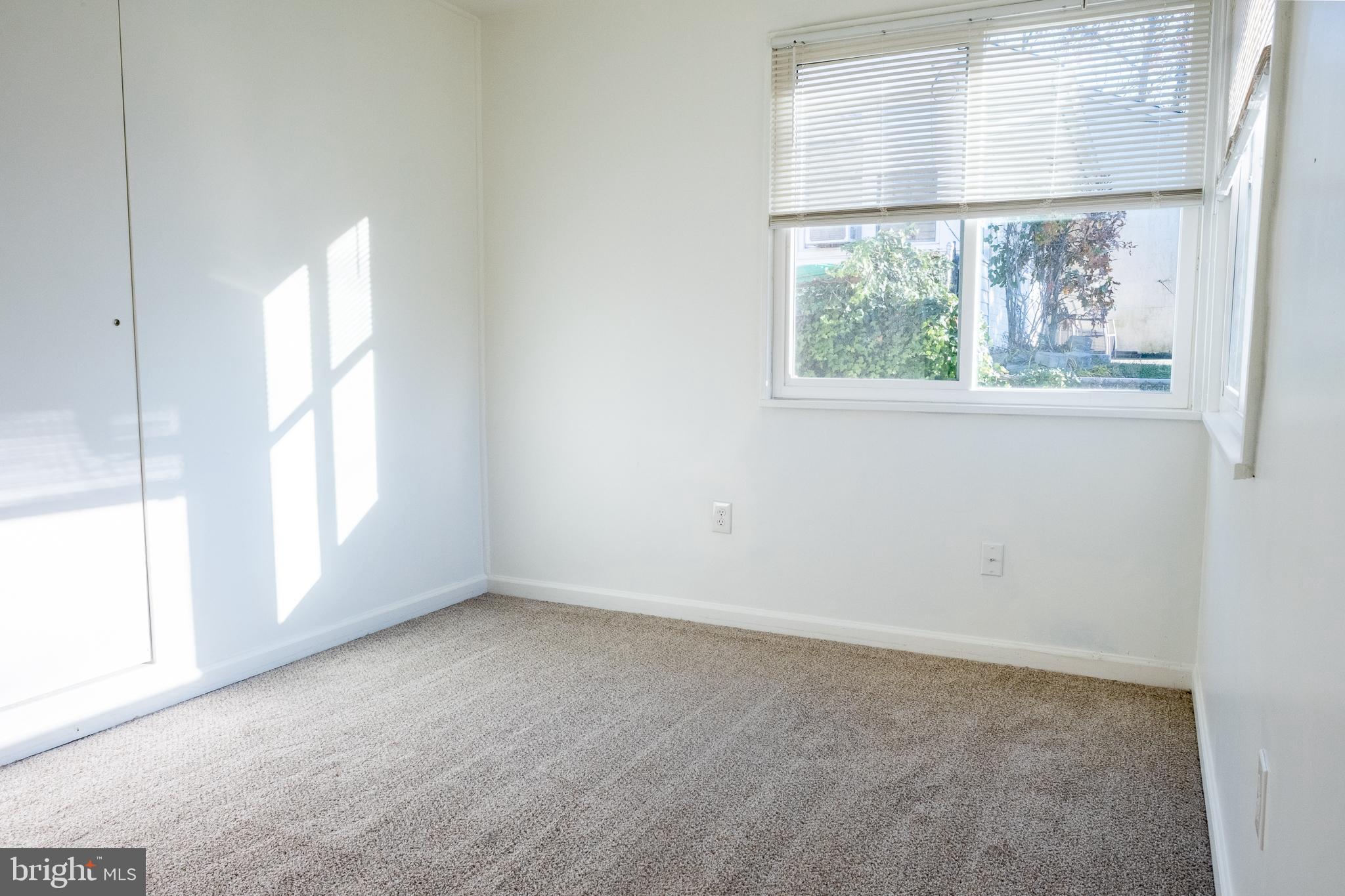 2027 Barlowe Place Landover, MD 20785 - Photo 9 of 20 an empty room with a window