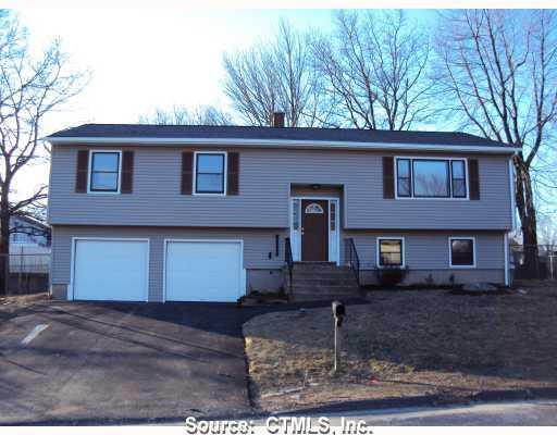 250 Haddad Road Waterbury, CT 06708 - Photo 1 of 1 a view of a house with a yard