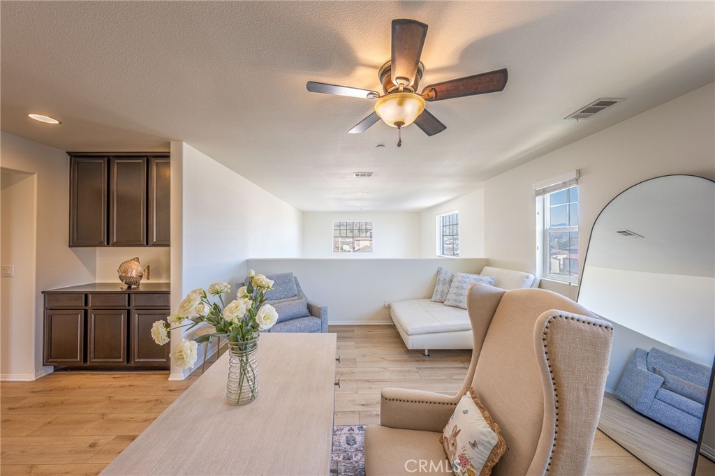 5062 Woodley Ridge Drive Rancho Cucamonga, CA 91739 - Photo 16 of 33 a living room with furniture