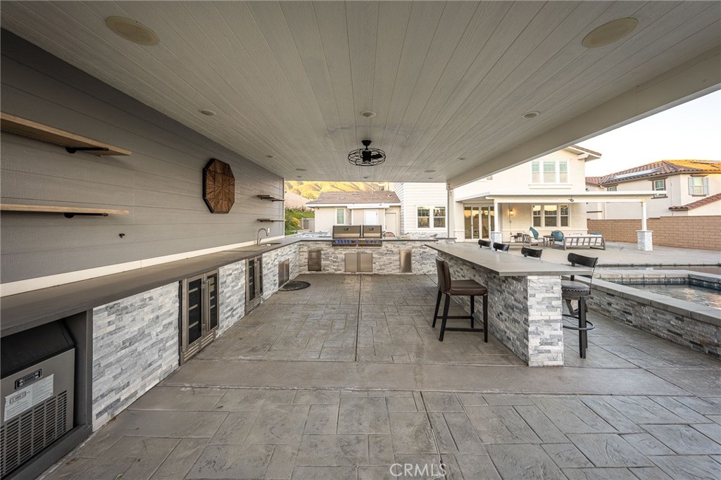 5062 Woodley Ridge Drive Rancho Cucamonga, CA 91739 - Photo 27 of 33 a lobby with furniture and a large window