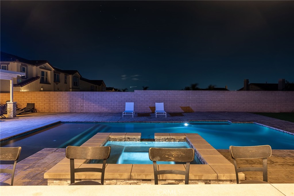 5062 Woodley Ridge Drive Rancho Cucamonga, CA 91739 - Photo 31 of 33 a view of swimming pool with seating space