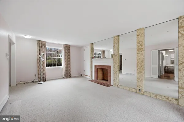 a view of a glass door with a balcony