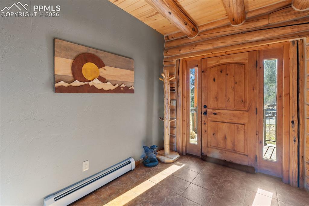 9110 Mountain Road Cascade, CO 80809 - Photo 2 of 49 a view of an empty room with a window