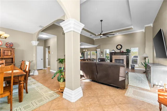 a view of a livingroom with furniture and a flat screen tv