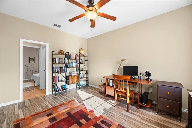 a workspace with furniture and a window