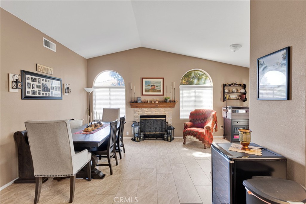 20403 Ochoa Road Apple Valley, CA 92307 - Photo 23 of 48 a living room with furniture and a fireplace