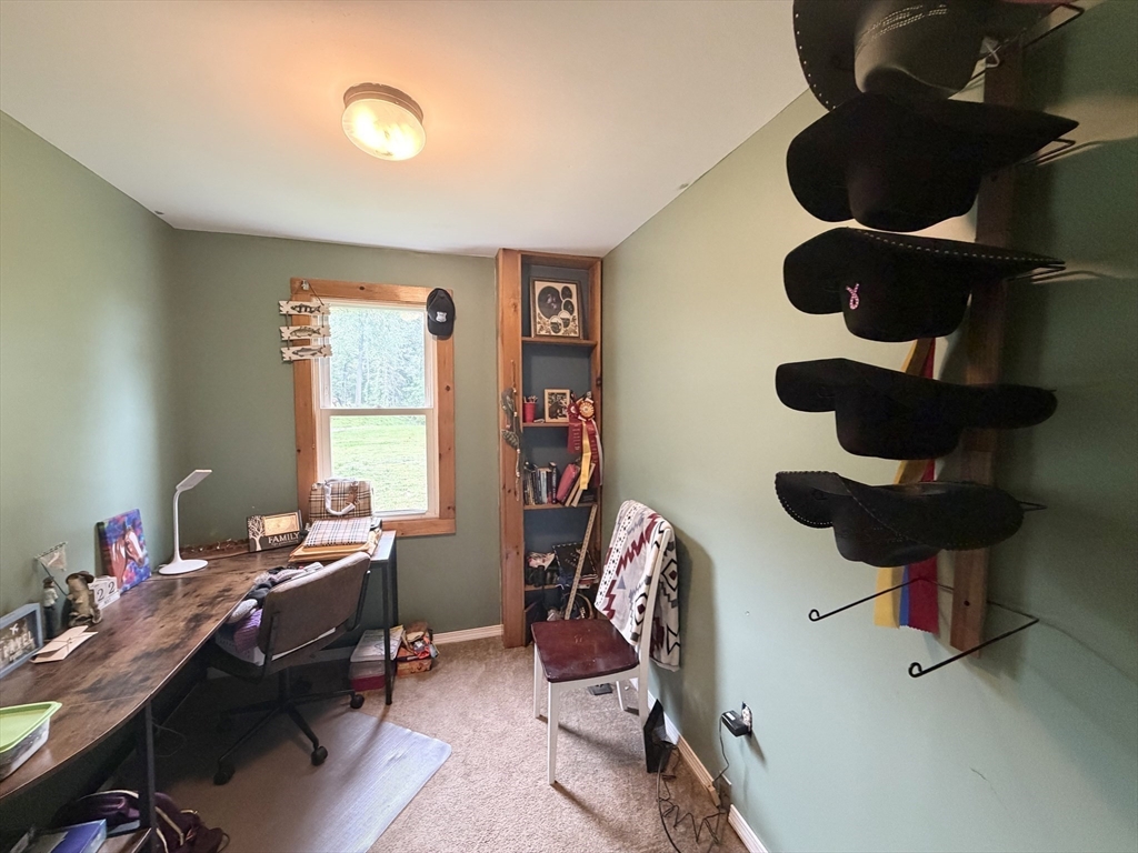 271 Lower Road Deerfield, MA 01342 - Photo 18 of 40 a view of a workspace with furniture and a window