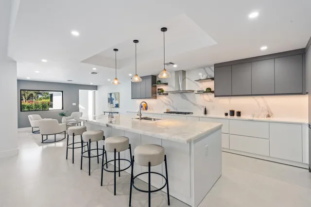 a view of a living room and a potted plant