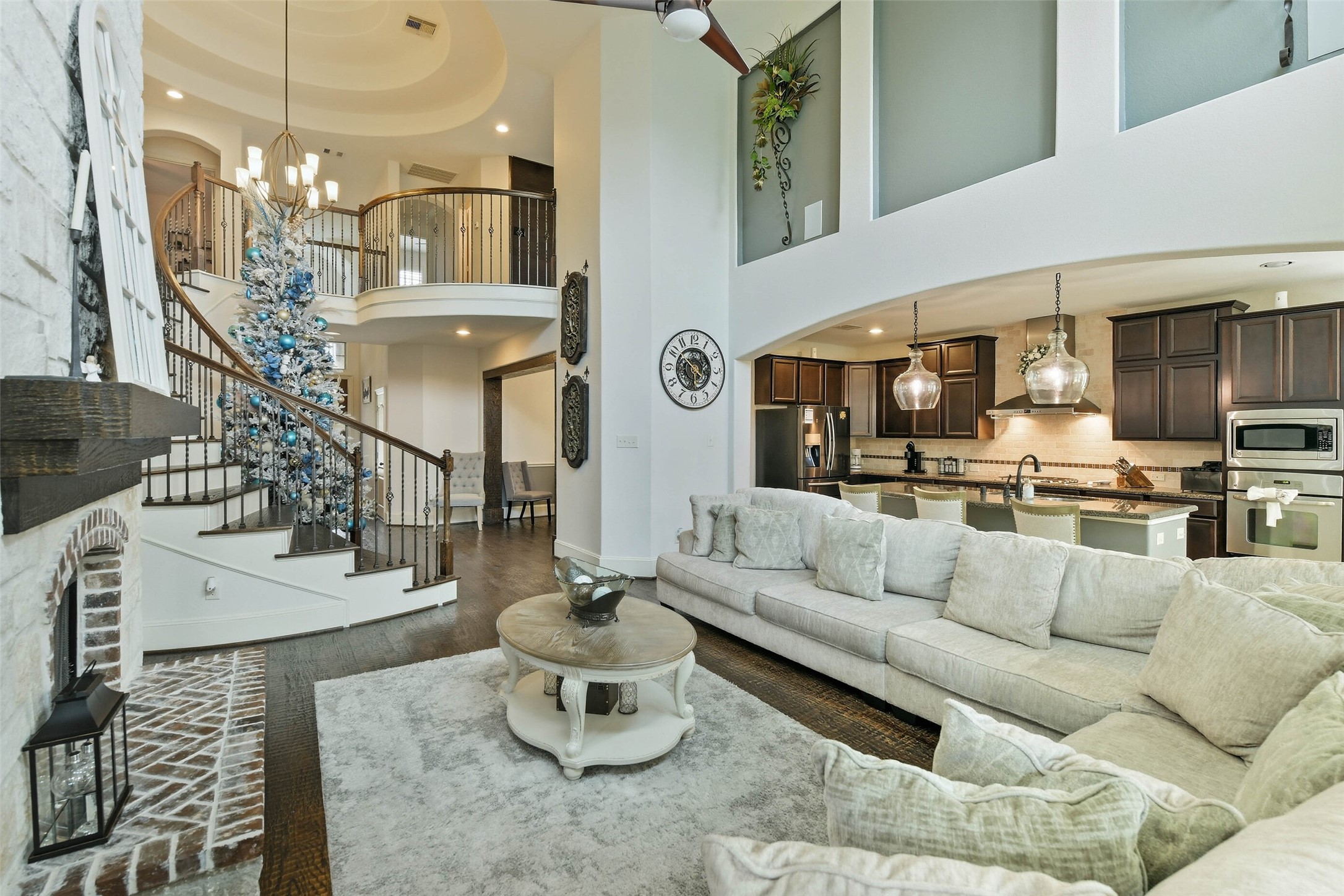 17611 Fossil Ridge Lane Humble, TX 77346 - Photo 10 of 36 a living room with furniture kitchen and a chandelier