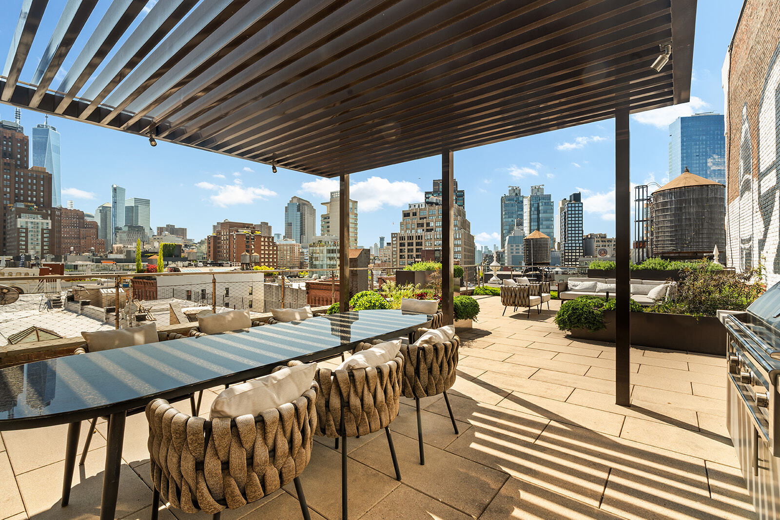 62 Wooster Street, Unit 4 Manhattan, NY 10010 - Photo 11 of 13 a balcony with furniture and a view of city from a balcony