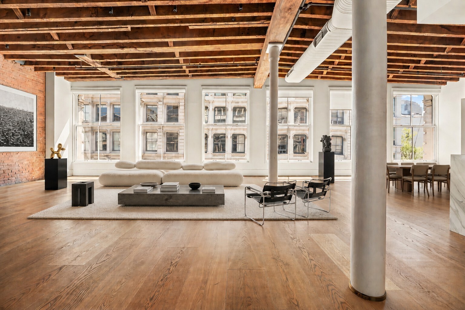 62 Wooster Street, Unit 4 Manhattan, NY 10010 - Photo 12 of 13 a lobby with furniture and floor to ceiling window