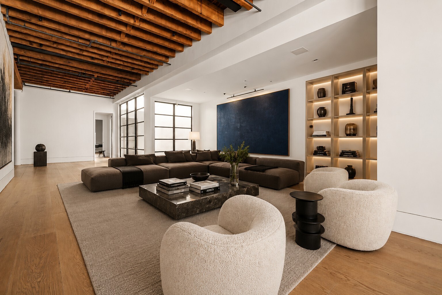 62 Wooster Street, Unit 4 Manhattan, NY 10010 - Photo 5 of 13 a living room with furniture and a flat screen tv