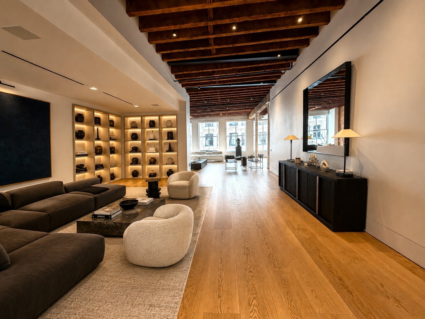 62 Wooster Street, Unit 4 Manhattan, NY 10010 - Photo 6 of 13 a living room with furniture and a flat screen tv