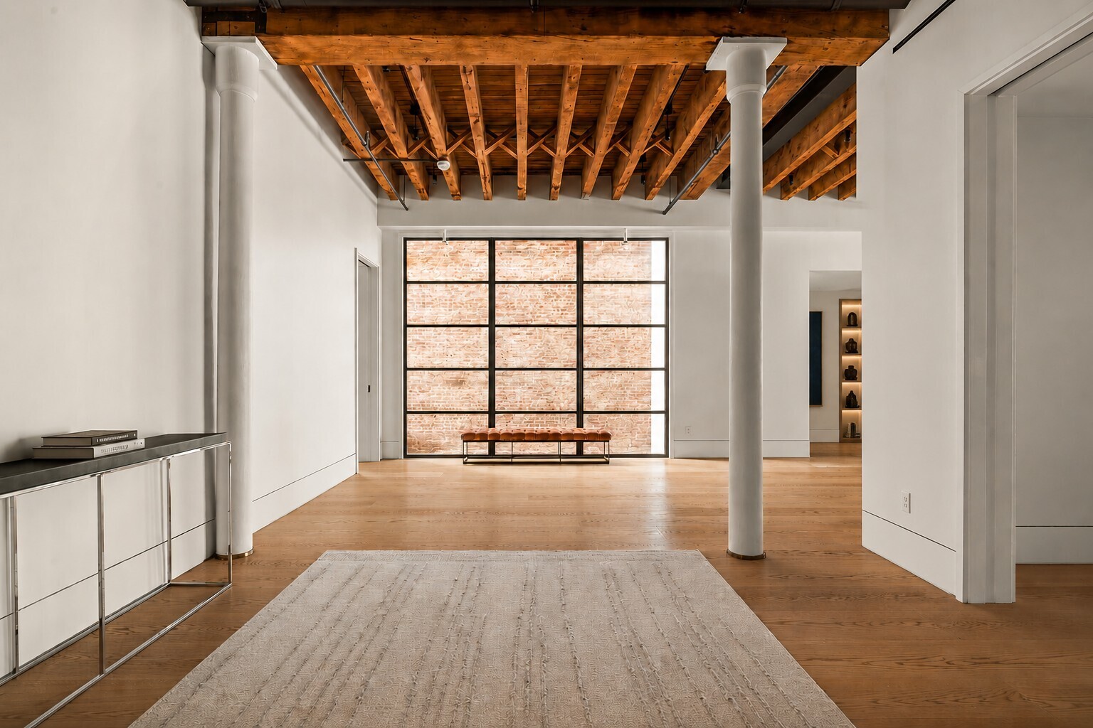 62 Wooster Street, Unit 4 Manhattan, NY 10010 - Photo 7 of 13 wooden floor in an empty room with a window