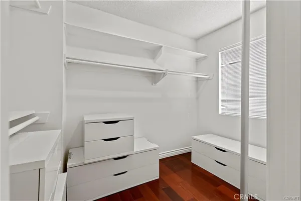 a view of an empty walk in closet