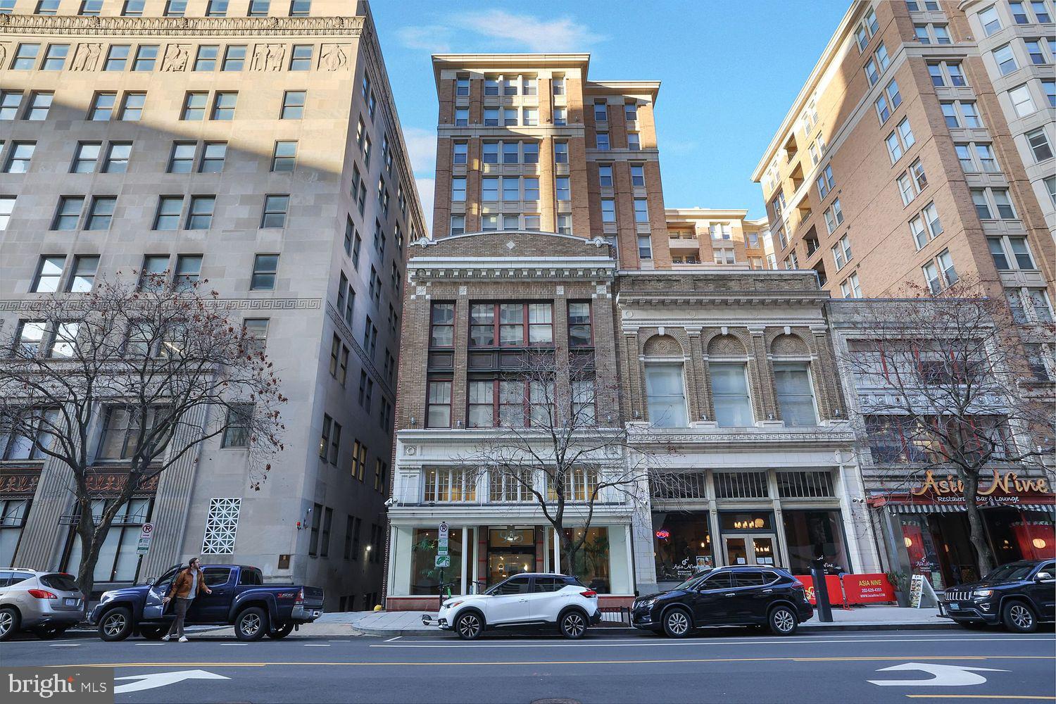915 E Street Northwest, Unit 403 Washington, DC 20004 - Photo 28 of 30 front view of a building with a street