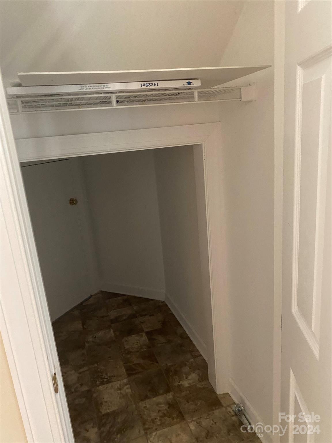1623 Caille Court Fort Mill, SC 29708 - Photo 19 of 41 a view of a room with rack on the wall
