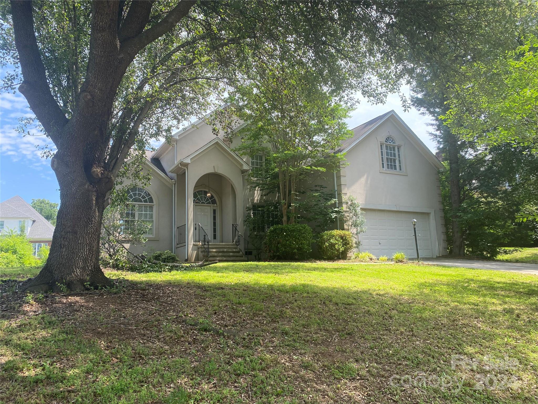 1623 Caille Court Fort Mill, SC 29708 - Photo 2 of 41 a view of a house with a yard and large tree