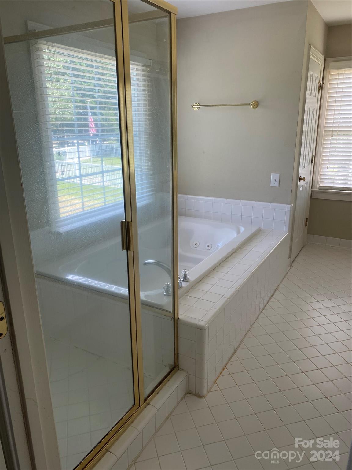 1623 Caille Court Fort Mill, SC 29708 - Photo 28 of 41 a view of a bathroom with a tub and shower